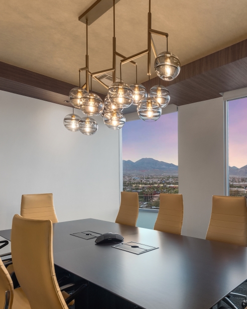 Sedona Triple Chandelier, Transparent Smoke/Aged BrassPhotographer: Stephen Morgan
